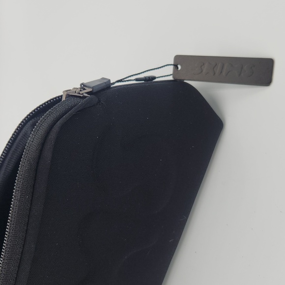 SKIMS Neoprene Pouch in Soot Black Cosmetic Bag - Picture 5 of 7